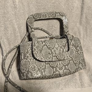 Women's faux snake clutch